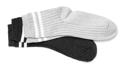 Pairs of stylish socks isolated on white, top view