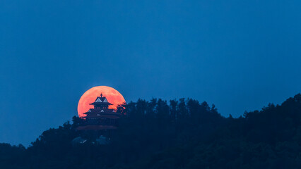 The moon rises in the attic