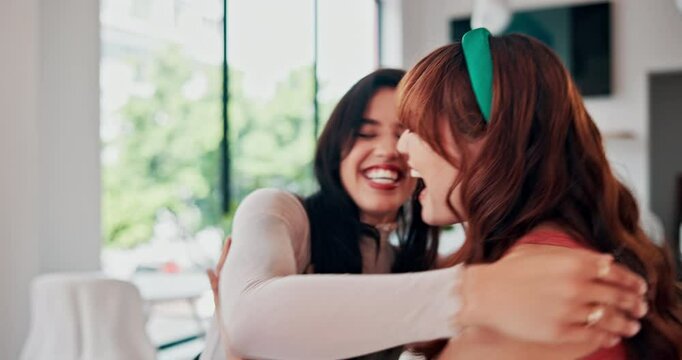 Laptop, excited and women in office with good news, achievement or success for startup company. Happy, computer and young creative female small business owners hugging for celebration in workplace.