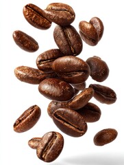 Obraz premium Coffee Beans Falling in Air Isolated on White Background Close-up