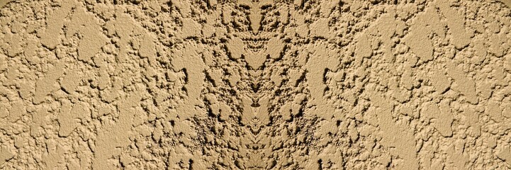 Vue de près sur un mur, avec effet de couleur jaune clair et effet symétrique