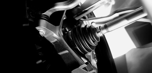 Car suspensions. Close up of a car suspension parts system such as CV joint Rubber boot and Control...