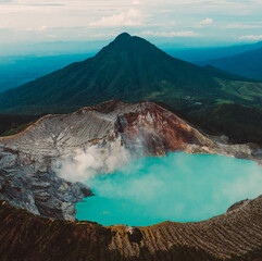 Aerial view of Misty Volcano of Kawah Ijen crater in East Java