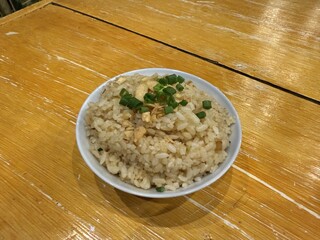 close up of a bowl of garlic fried rice 