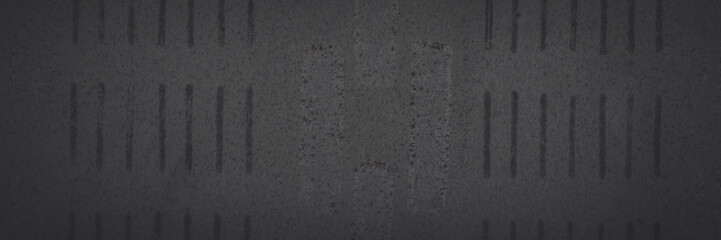 Old faded paper wallpaper with a classic pattern. Dark panoramic background for design. Shaded vintage tattered paper texture. Wide panorama with vignette.