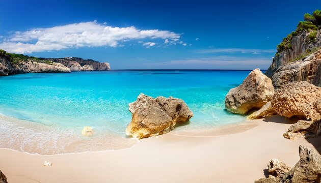 Rocks and sand in Cala Mariolu