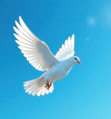 A white dove in flight against a vibrant blue sky.  Symbol of peace and hope.