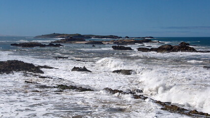 Rugged coastline below the old city walls of the medina in Essaouira, Morocco