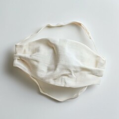 Organic cotton sleep mask on white background for peaceful sleep and relaxation