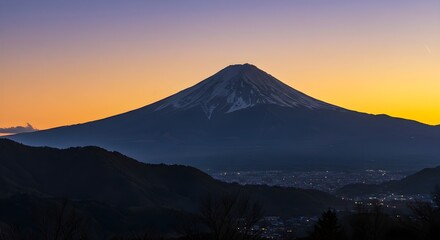 Fototapeta premium Majestic Mount Fuji at sunset, its snow-capped peak silhouetted against a vibrant sky. A breathtaking view of nature's beauty.