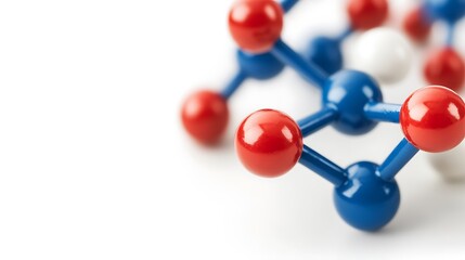 Obraz premium Abstract Molecular Model Red, Blue, and White Spheres Connected on White Background