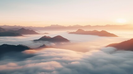 Serene Sunrise Above a Sea of Clouds and Mountain Peaks