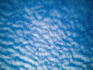 Blue sky filled with altocumulus clouds, Atmosphere
