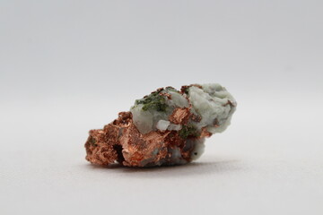 Raw copper (cu - Cuprum) isolated on a white background. Raw copper ore from California 