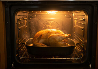 Golden Roasted Turkey Steaming in Oven