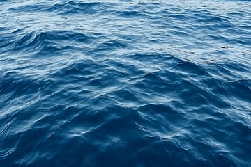 Calm sapphire waters rippling gently under natural daylight conditions