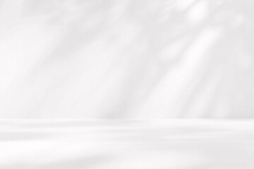 Obraz premium White silk fabric texture with metallic and brushed steel elements, creating a smooth, shiny surface with a subtle grey pattern.