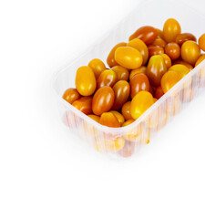 Plastic container of fresh yellow and orange cherry tomatoes isolated on white background. Tomatoes in transparent pack, perfect for grocery, retail, and food market visual content. Copy space