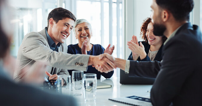 Happy, businessmen and applause with handshake for partnership, agreement or good deal at conference. Business people, colleagues or employees shaking hands with team for introduction at workplace