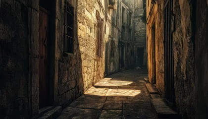 Sunlit alleyway between aged stone buildings.