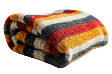 Warm woolen throw blanket richly textured with autumnal stripes cozy and inviting against black