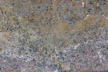Weathered Cheap Uneven Concrete Surface with Pebbles