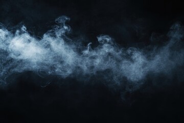 White wisps of smoke rising against a dark black background space