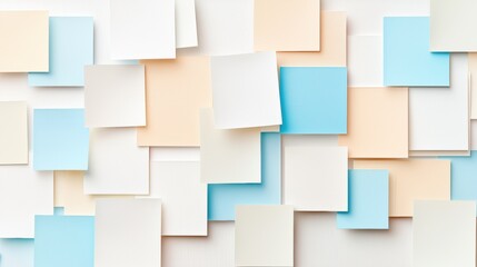 A collection of white, light blue, and peach sticky notes arranged in a grid-like pattern.