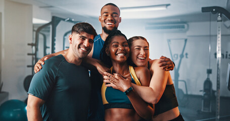 Obraz na płótnie Canvas Fitness. portrait and group of friends in gym with smile, support and team workout together. Men, women and happy personal trainer at sports club for exercise, body building and diversity in class