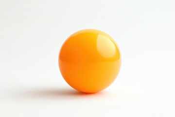 Fototapeta premium Orange sphere on plain background