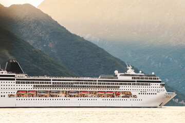 Majestic mountains and cruise at sunset