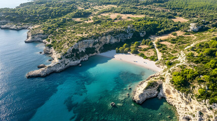 Aerial view showcases a secluded beach nestled amidst cliffs and turquoise waters