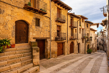 Narrow cobbled alleys with old stone houses in the pretty village of Valderrobres, Teruel.