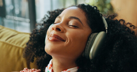 Relax, music and woman with headphones on couch, streaming sound or subscription for song in home....