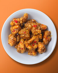 Chinese Orange Chicken top view on bowl