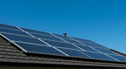 solar panels on rooftop with blue sky and sunny day