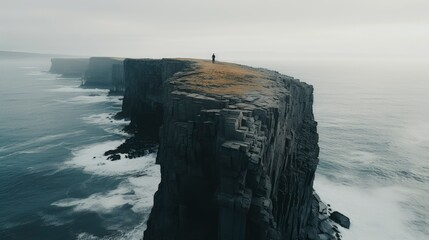 Solitary Figure on Dramatic Coastal Cliffs, Ocean Vista