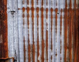 Textured of old rusty zinc galvanized iron sheet.