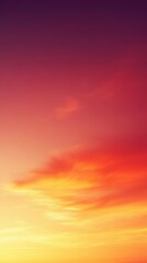 Fototapeta premium Beautiful sunset with vibrant colors illuminating the evening sky over tranquil landscape