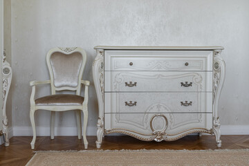 retro bedroom furniture design. beige dressing table with drawers, wooden chair with upholstered seat, large retro-style wardrobe. a retro-style bedroom.