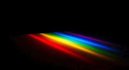 Obraz premium Rainbow Spectrum Light Dispersion on Dark Background
