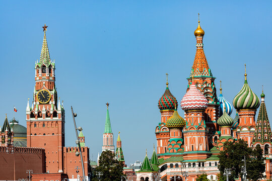 View of St. Basil's Cathedral and Spasskaya tower of Kremlin on Red Square in Moscow, Russia