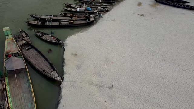 Drone shot of Jamuna River and boat in riverbank, Bangladesh