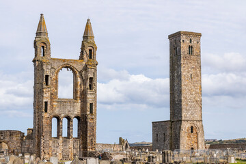 The ruins of St Andrews Cathedral overlook the sea, surrounded by ancient tombs and old stone...
