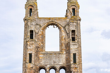 The ruins of St Andrews Cathedral overlook the sea, surrounded by ancient tombs and old stone...