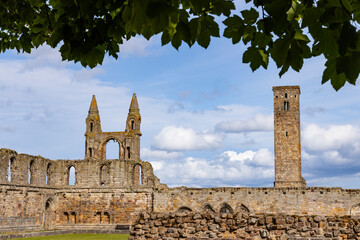 The ruins of St Andrews Cathedral overlook the sea, surrounded by ancient tombs and old stone...