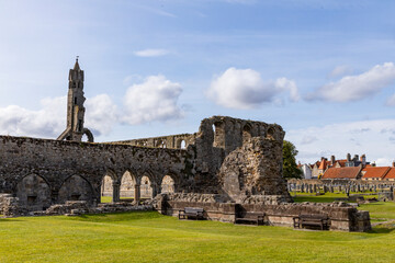 The ruins of St Andrews Cathedral overlook the sea, surrounded by ancient tombs and old stone...