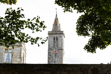 The ruins of St Andrews Cathedral overlook the sea, surrounded by ancient tombs and old stone...