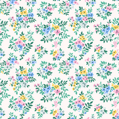 Beautiful floral pattern in small vintage flowers. Small pink, blue and yellow flowers. White background. Ditsy print. Floral seamless background. Gentle template for fashion prints. Stock pattern