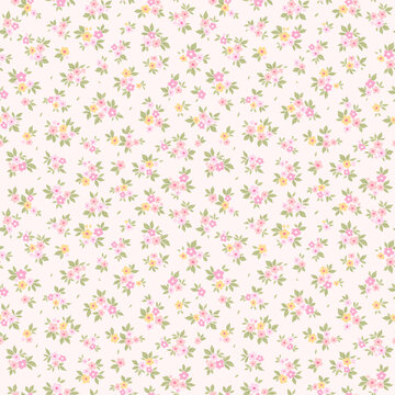 Vintage floral background. Floral pattern with small pink and yellow flowers on a ivory beige background. Seamless pattern for design and fashion prints. Ditsy style. Stock vector pattern with daisy.